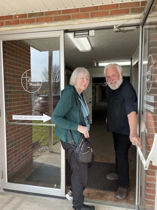 Welcoming greeters at the church entrance